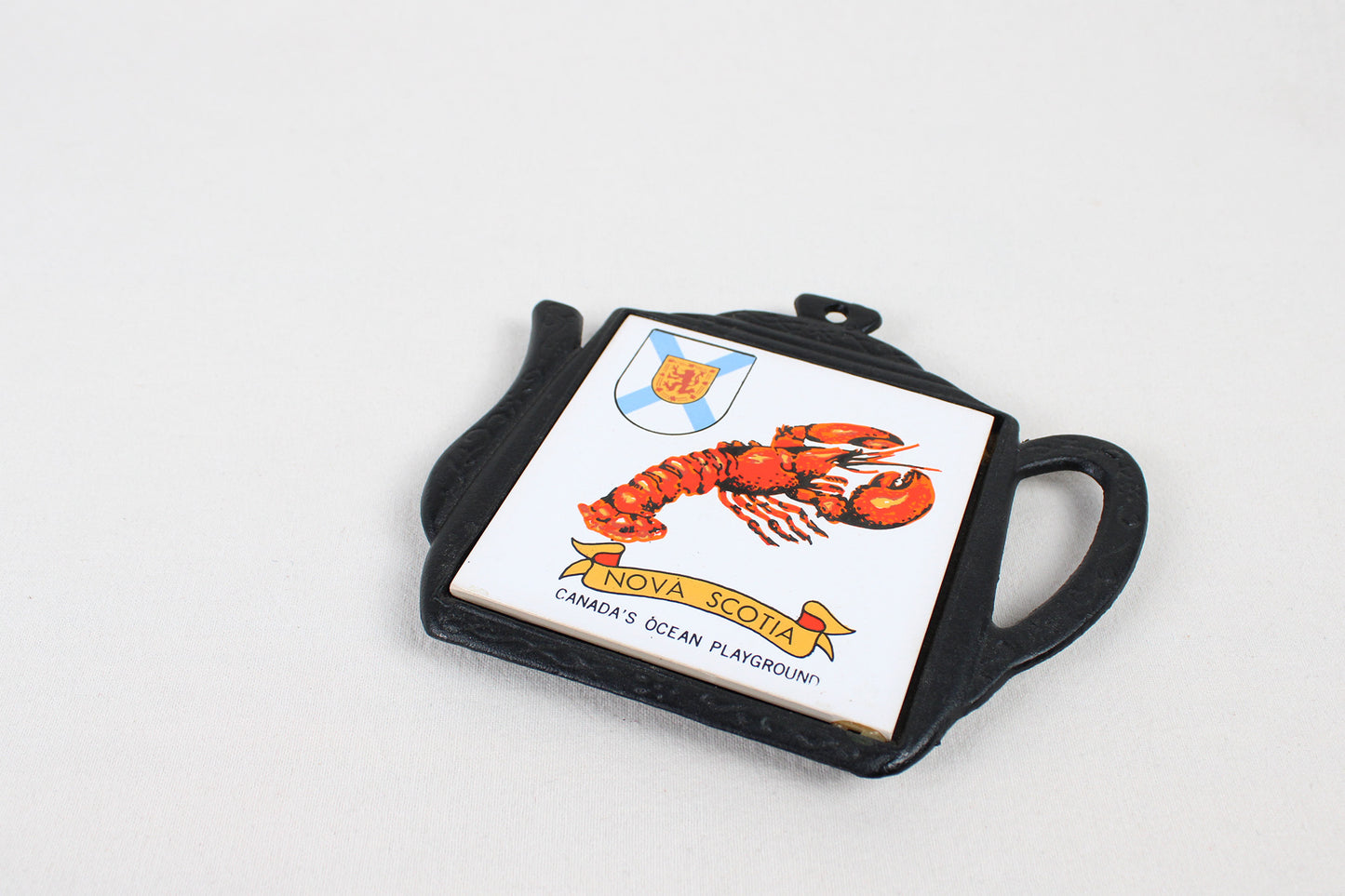 Nova Scotia “Canada’s Ocean Playground” Cast Iron Trivet