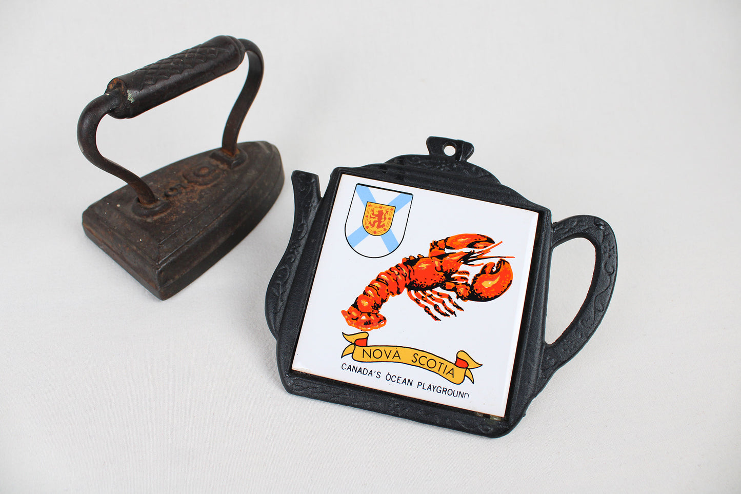 Nova Scotia “Canada’s Ocean Playground” Cast Iron Trivet