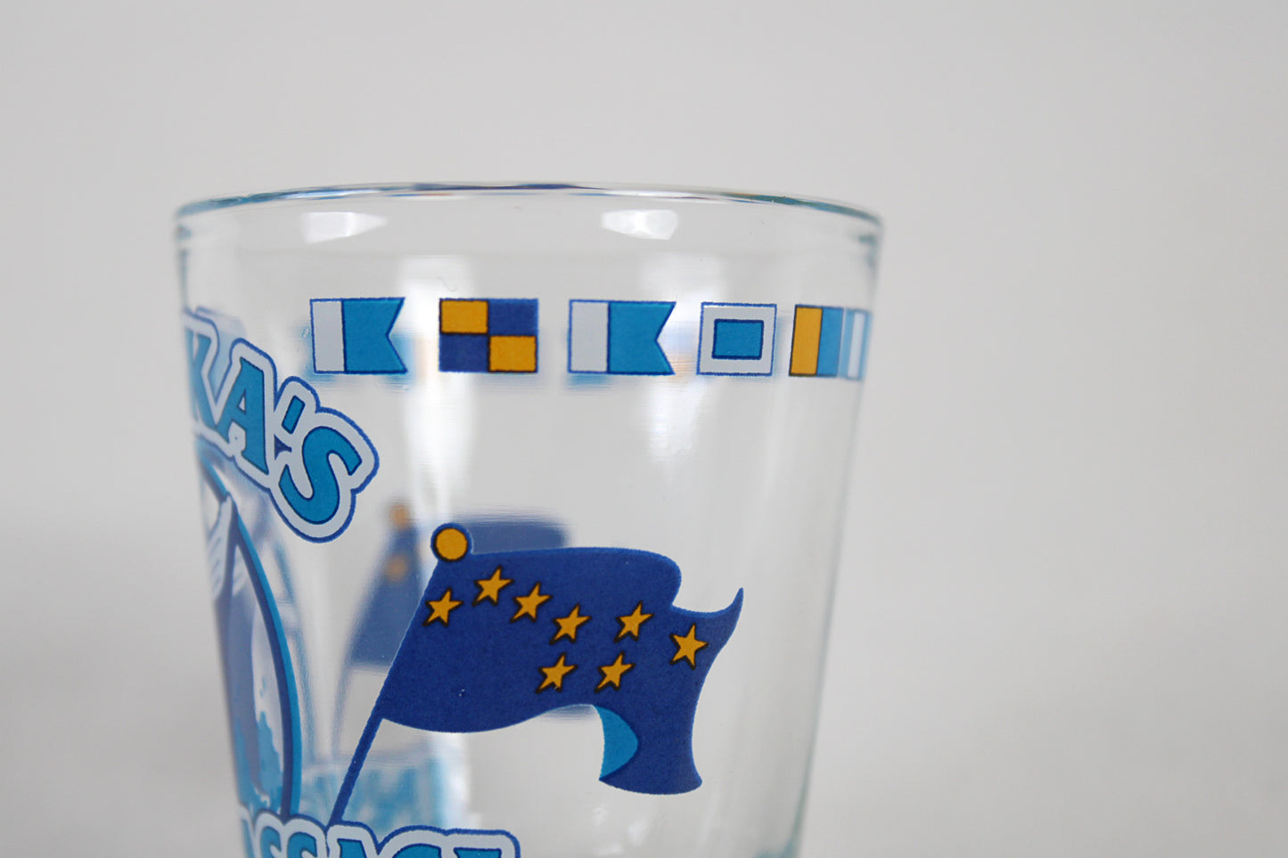 Alaska’s Inside Passage Shot Glass With State Flag And Semaphores