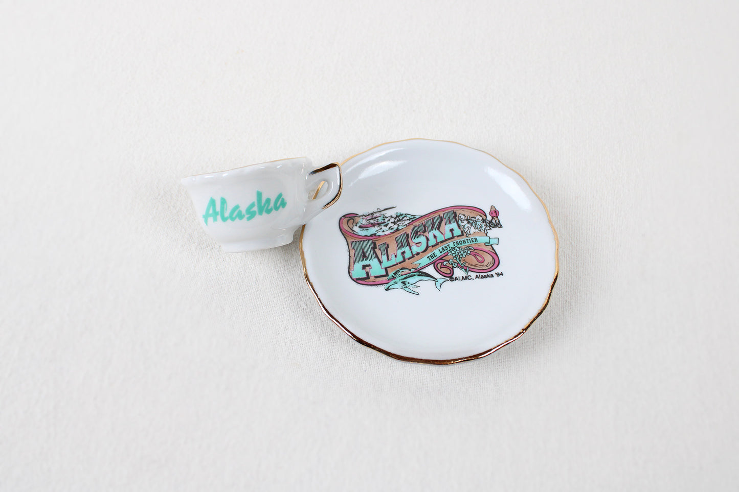 Alaska “The Last Frontier” Miniature Ceramic Cup And Saucer Decorative Set