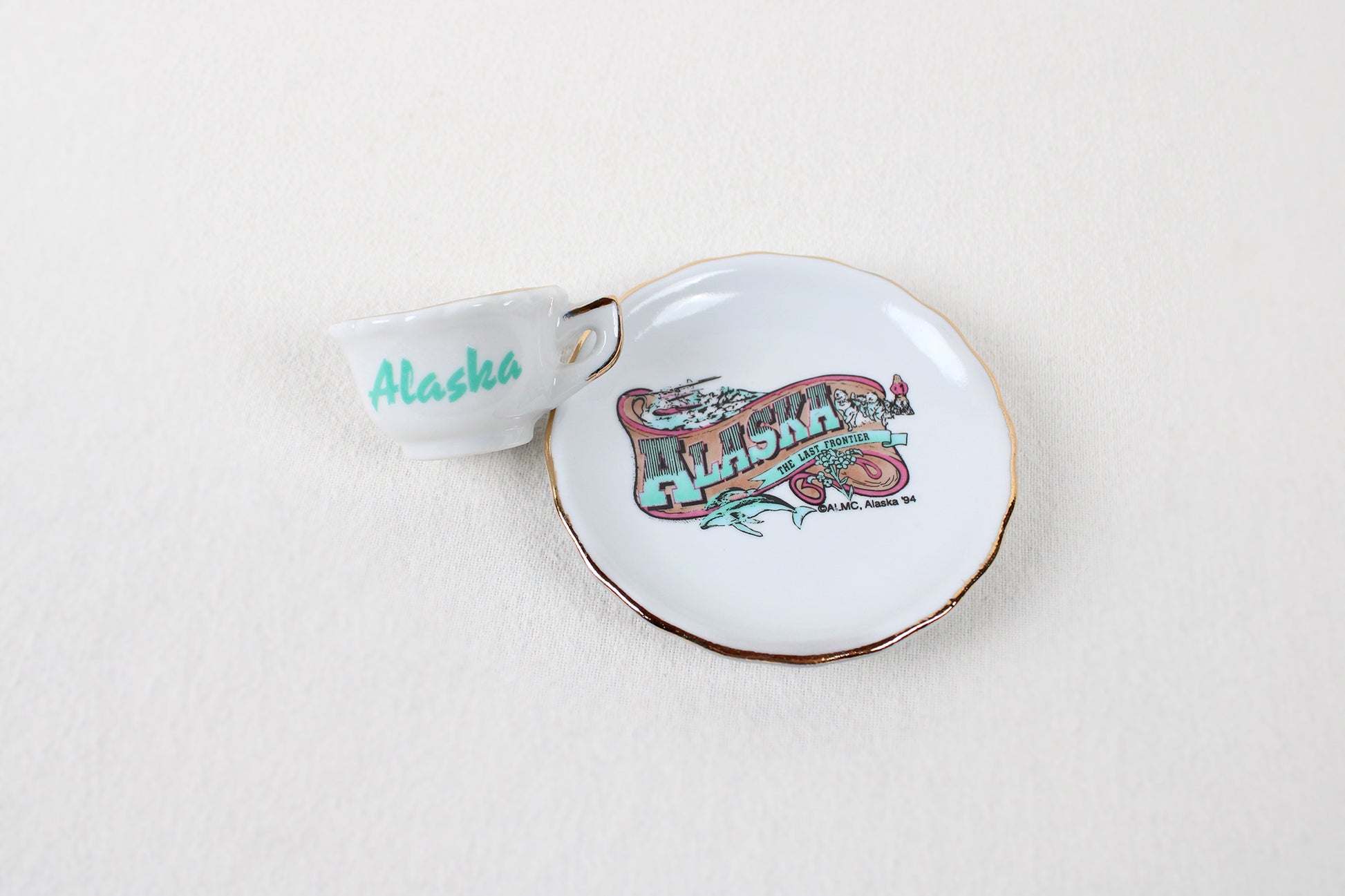 Alaska “The Last Frontier” Miniature Ceramic Cup And Saucer Decorative Set