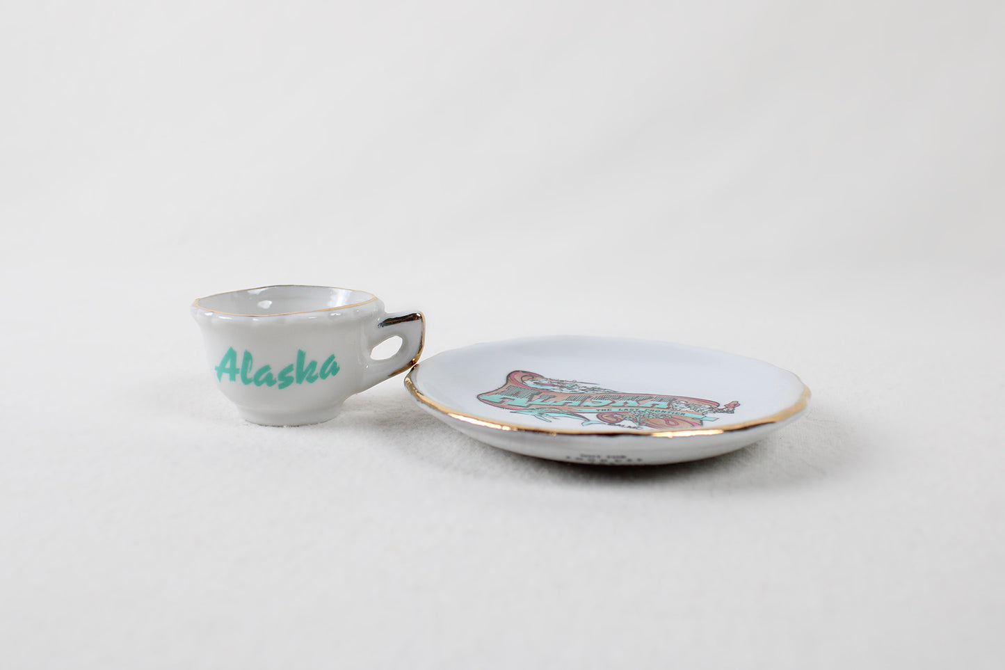 Alaska “The Last Frontier” Miniature Ceramic Cup And Saucer Decorative Set