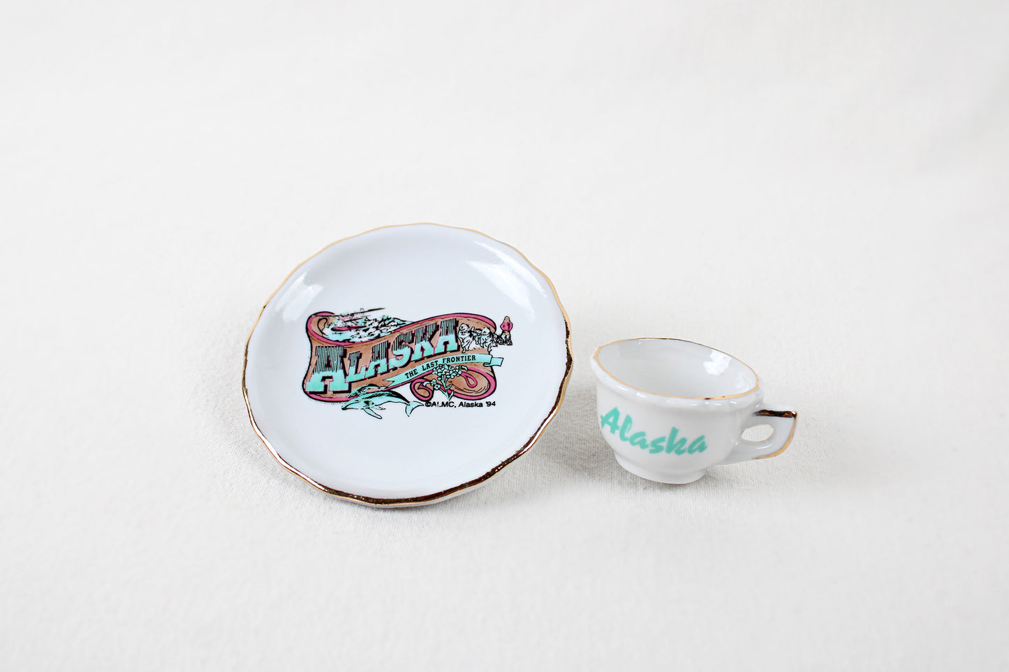 Alaska “The Last Frontier” Miniature Ceramic Cup And Saucer Decorative Set