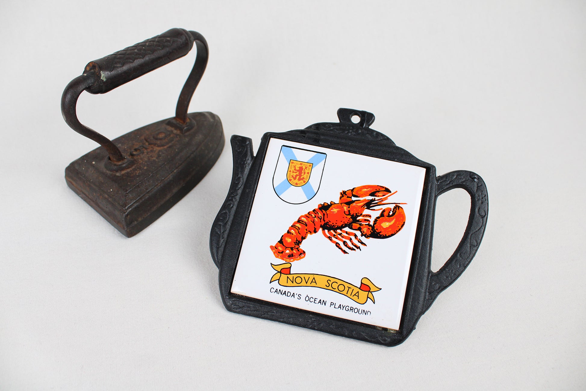Nova Scotia “Canada’s Ocean Playground” Cast Iron Trivet