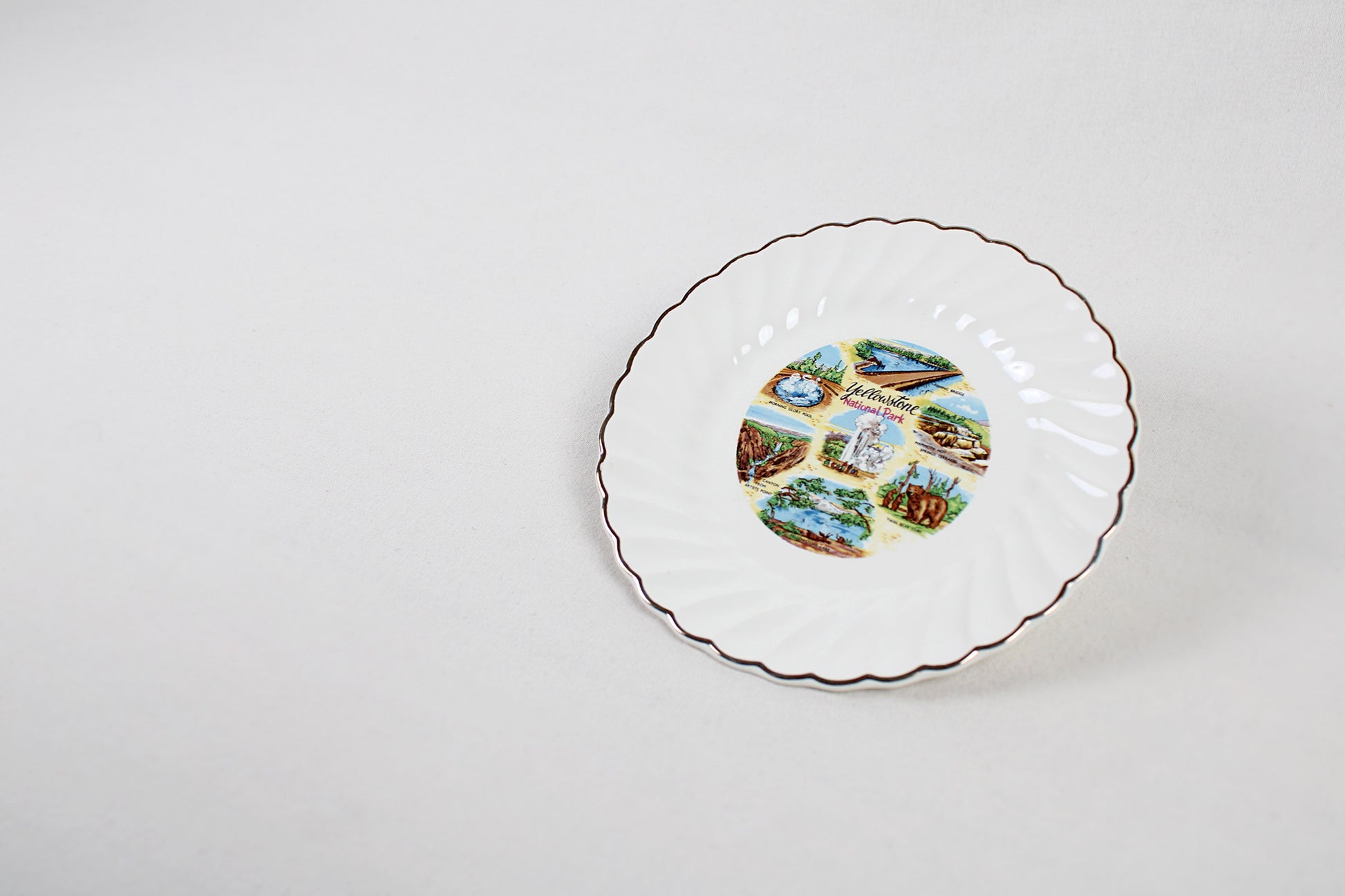 Yellowstone National Park Souvenir Plate With Montage of Attractions